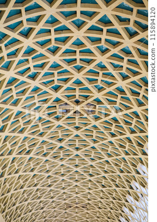 Architectural detail texture background with oriental hexagonal grid pattern Architectural detail texture background with oriental hexagonal grid pattern 115894120