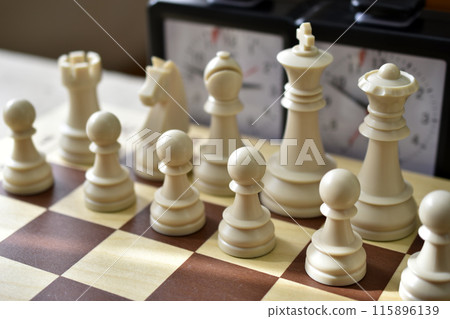 A chess board and a chess clock. Chess competitions. A chess board and a chess clock. Chess competitions. 115896139