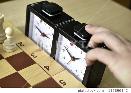A chess board and a chess clock. Chess competitions. 115896142