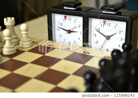 A chess board and a chess clock. Chess competitions. 115896143