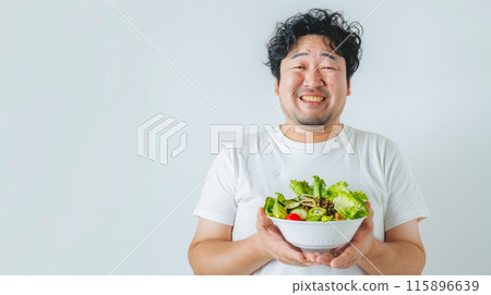 Japanese man having diet salad 115896639