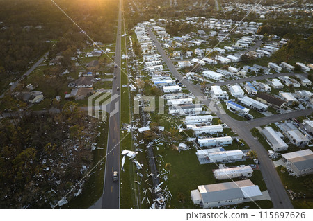 Destroyed by hurricane Ian suburban houses in Florida mobile home residential area. Consequences of natural disaster 115897626