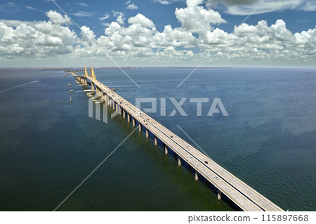Aerial view of Sunshine Skyway Bridge over Tampa Bay in Florida with moving traffic. Concept of transportation infrastructure 115897668