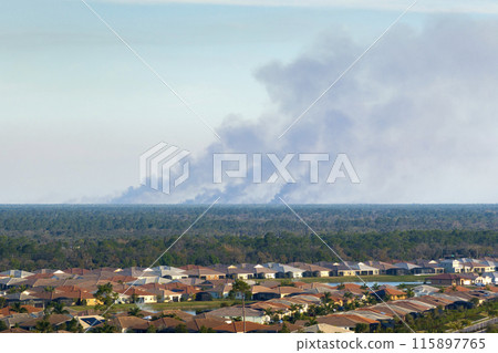 Air contamination with burning smoke from prescribed fire close to suburban area in Florida, USA Air contamination with burning smoke from prescribed fire close to suburban area in Florida, USA 115897765
