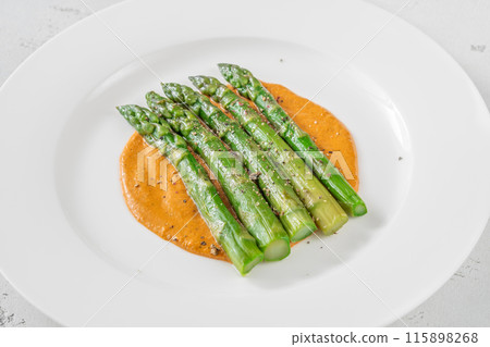 Asparagus with romesco sauce 115898268