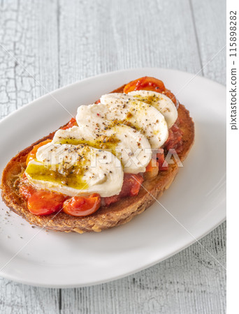 Tomato mozzarella bruschetta 115898282