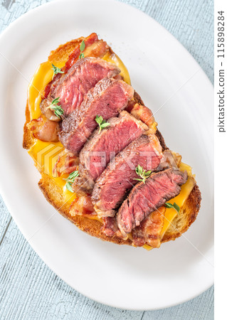 Bacon and steak bruschetta 115898284