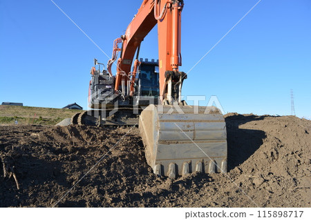 Construction machine at civil engineering construction site Construction machine at civil engineering construction site 115898717