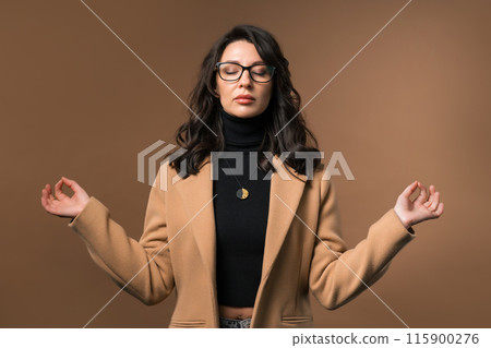 Calm Mid Aged Woman Relaxing, Refuses Stress, Overwork. Breathes Deeply On Beige 115900276