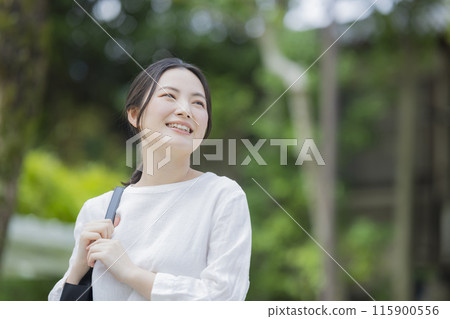 Woman commuting Woman commuting 115900556