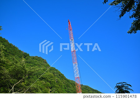 Aimata Dam under construction, Crane tower in the mountains, Sarugakyo, Season of fresh greenery Aimata Dam under construction, Crane tower in the mountains, Sarugakyo, Season of fresh greenery 115901478