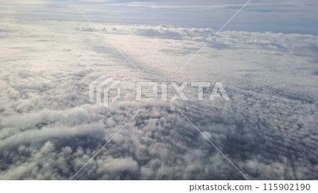 Expansive Aerial View of Fluffy Clouds Expansive Aerial View of Fluffy Clouds 115902190
