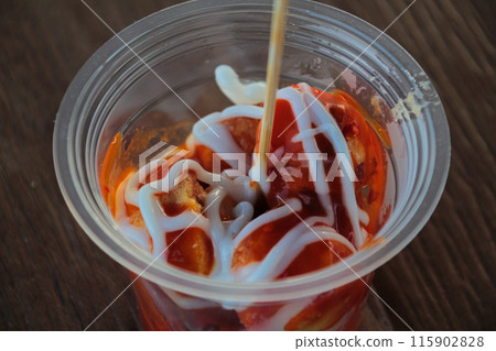 street food, Telur gulung or Egg rolls topped with sauce and mayonnaise 115902828