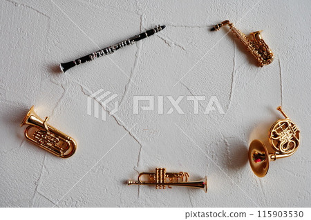 Miniature clarinets, saxophones, trumpets, horns, and euphoniums. 115903530