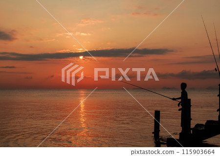 sunrise on the beach pier bridge with a clear sky sunrise on the beach pier bridge with a clear sky 115903664