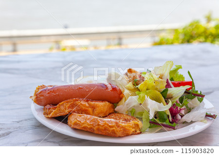 brunch with sausage and toast 115903820