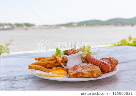 brunch with sausage and toast 115903821