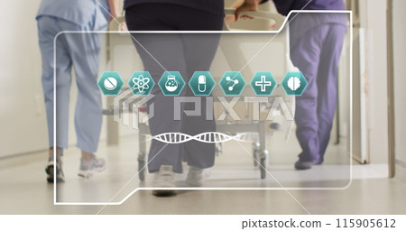 Image of dna strand and icons over diverse doctors at hospital Image of dna strand and icons over diverse doctors at hospital 115905612