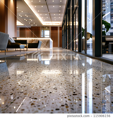 A lengthy hall with glossy marble flooring stretching across the building, reflecting the city lights through glass walls 115906156