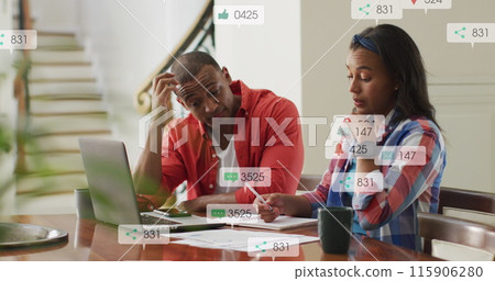 Image of multiple notification bars over diverse couple calculating expenses at home Image of multiple notification bars over diverse couple calculating expenses at home 115906280