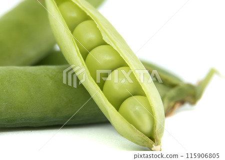 Fresh green peas in a pod on a white background 115906805