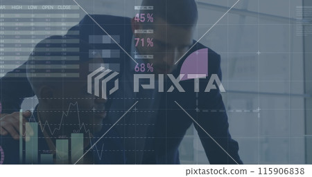 Image of financial data processing over two diverse business people Image of financial data processing over two diverse business people 115906838