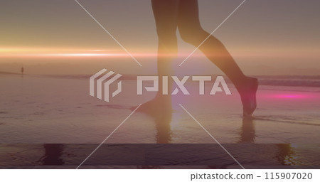 Image of light spots over caucasian woman at beach Image of light spots over caucasian woman at beach 115907020