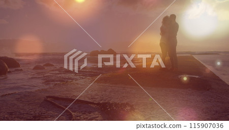 Image of light spots over african american couple at beach Image of light spots over african american couple at beach 115907036