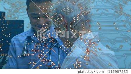 Microprocessor connections against asian male doctor examining caucasian senior woman at hospital 115907285