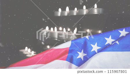 Image of snow falling over candles and flag of usa 115907801