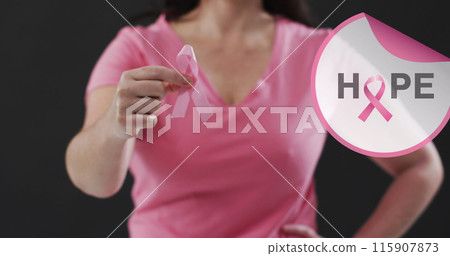 Image of hope text over caucasian woman with pink ribbon on black background Image of hope text over caucasian woman with pink ribbon on black background 115907873