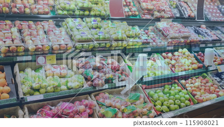 Image of financial data and graphs over fruits and vegetables in market 115908021