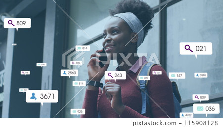Image of social media icons with growing numbers over african american woman using smartphone Image of social media icons with growing numbers over african american woman using smartphone 115908128
