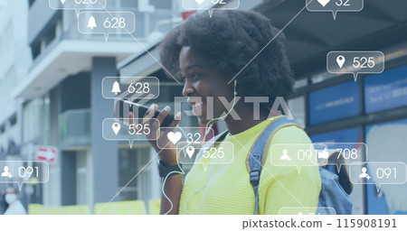 Image of social media icons over african american woman using smartphone Image of social media icons over african american woman using smartphone 115908191