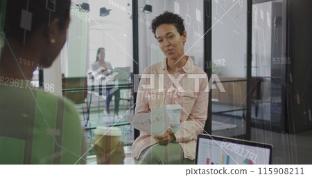 Image of financial data processing over diverse business people at office Image of financial data processing over diverse business people at office 115908211