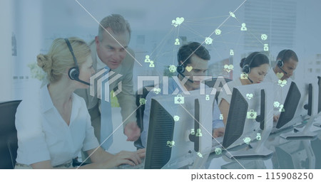 Image of media icons over diverse business people in office Image of media icons over diverse business people in office 115908250