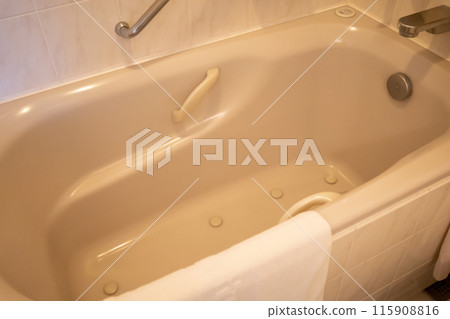 A spacious hotel bathtub A spacious hotel bathtub 115908816