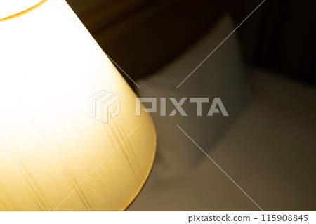 Hotel room bedside lighting 115908845