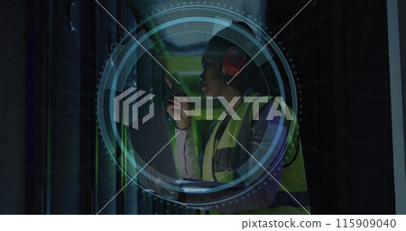 Image of cyber security text, magnifying glass, african american engineer checking data room 115909040