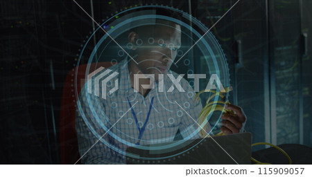 Image of fingerprint scanner over african american male engineer holding a cable at server room 115909057