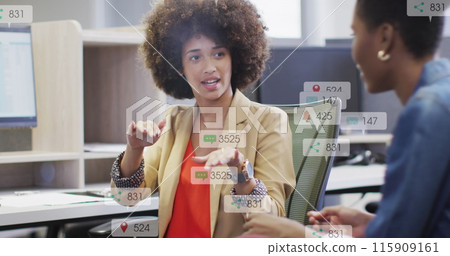 Image of notification bars over diverse woman explaining strategy to female coworker on desk 115909161