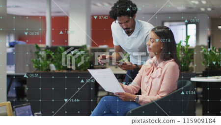 Image of changing numbers and icons over diverse coworkers discussing reports in office Image of changing numbers and icons over diverse coworkers discussing reports in office 115909184