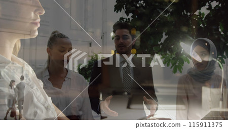 Image of caucasian businesswoman using computer over diverse business people talking Image of caucasian businesswoman using computer over diverse business people talking 115911375