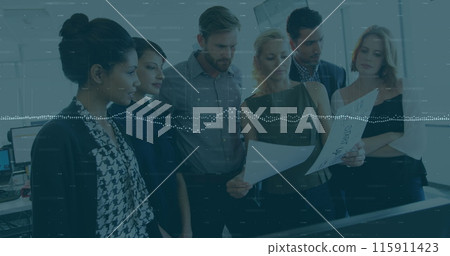 Image of data processing over diverse team of colleagues reading documents together at office Image of data processing over diverse team of colleagues reading documents together at office 115911423