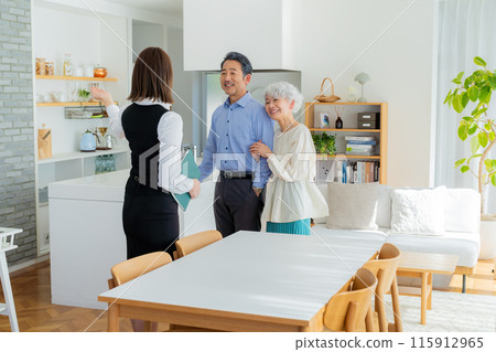 Senior couple visiting the showroom 115912965