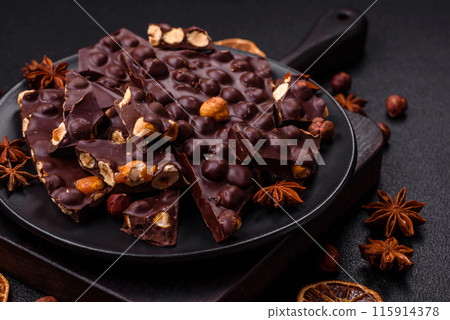 Black bitter chocolate with whole hazelnuts, candied fruits and mint Black bitter chocolate with whole hazelnuts, candied fruits and mint 115914378
