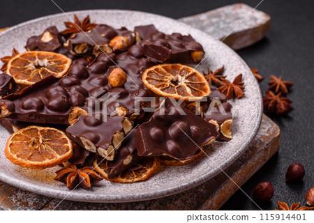 Black bitter chocolate with whole hazelnuts, candied fruits and mint Black bitter chocolate with whole hazelnuts, candied fruits and mint 115914401