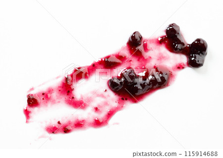 Blueberry jam blot on white background. Selective focus. Blueberry jam blot on white background. Selective focus. 115914688