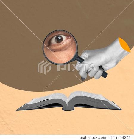 Human eyes look at a book through a magnifying glass 115914845