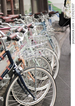 Bicycles lined up in an alley Bicycles lined up in an alley 115915307